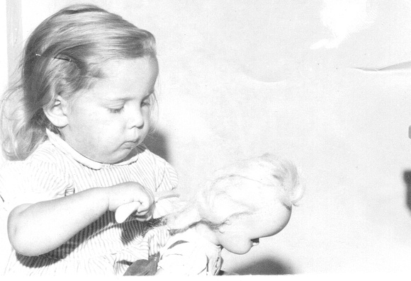 Norine Talley with doll