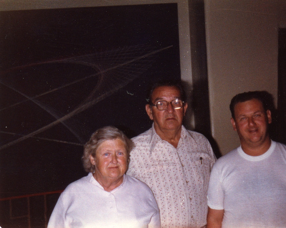 Ruth and Acie Mitchell with Johnny on the right